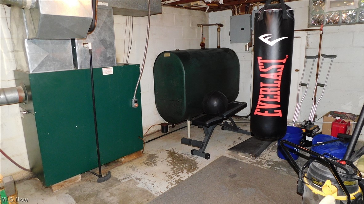 3651 Work Road Ravenna, OH 44266 - Photo 28 of 35 This room in is the 4th room in the basement it too has a lot of space that has the furnace and newer Hot Water tank