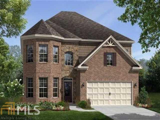 653 Bell Creek Road, Unit 16 Cumming, GA 30041 - Photo 1 of 1 a front view of a house with garden