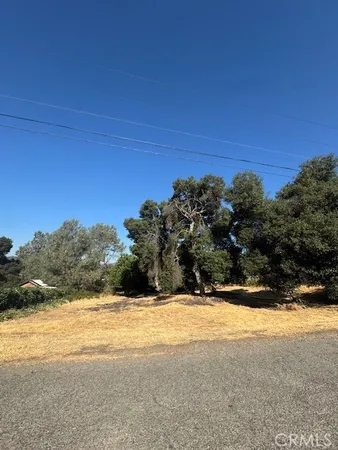 a view of ocean with a yard