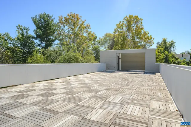 a view of a backyard of the house