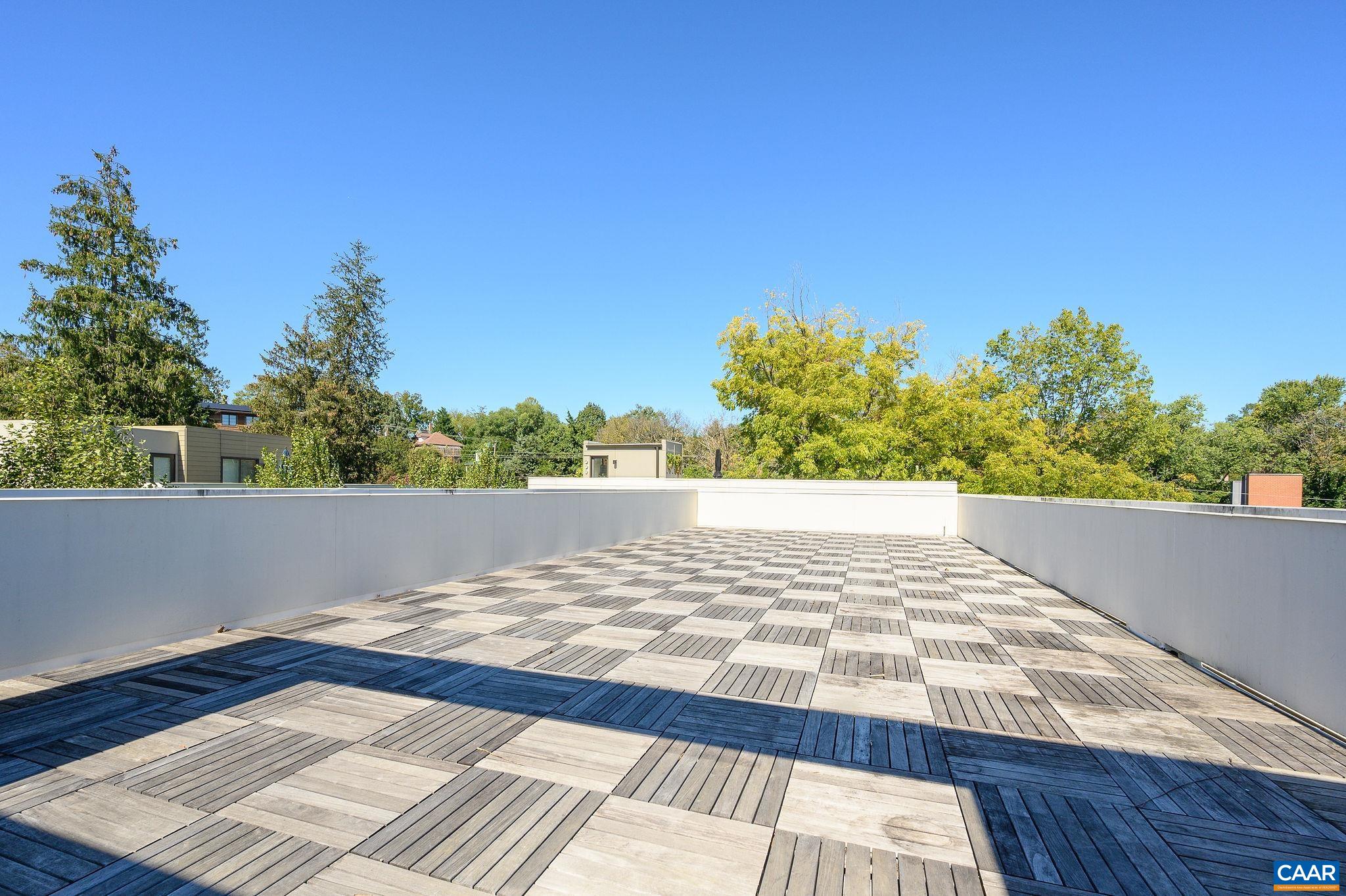 1130 East High Street, Unit J Charlottesville, VA 22902 - Photo 26 of 42 a view of an outdoor space with sitting space