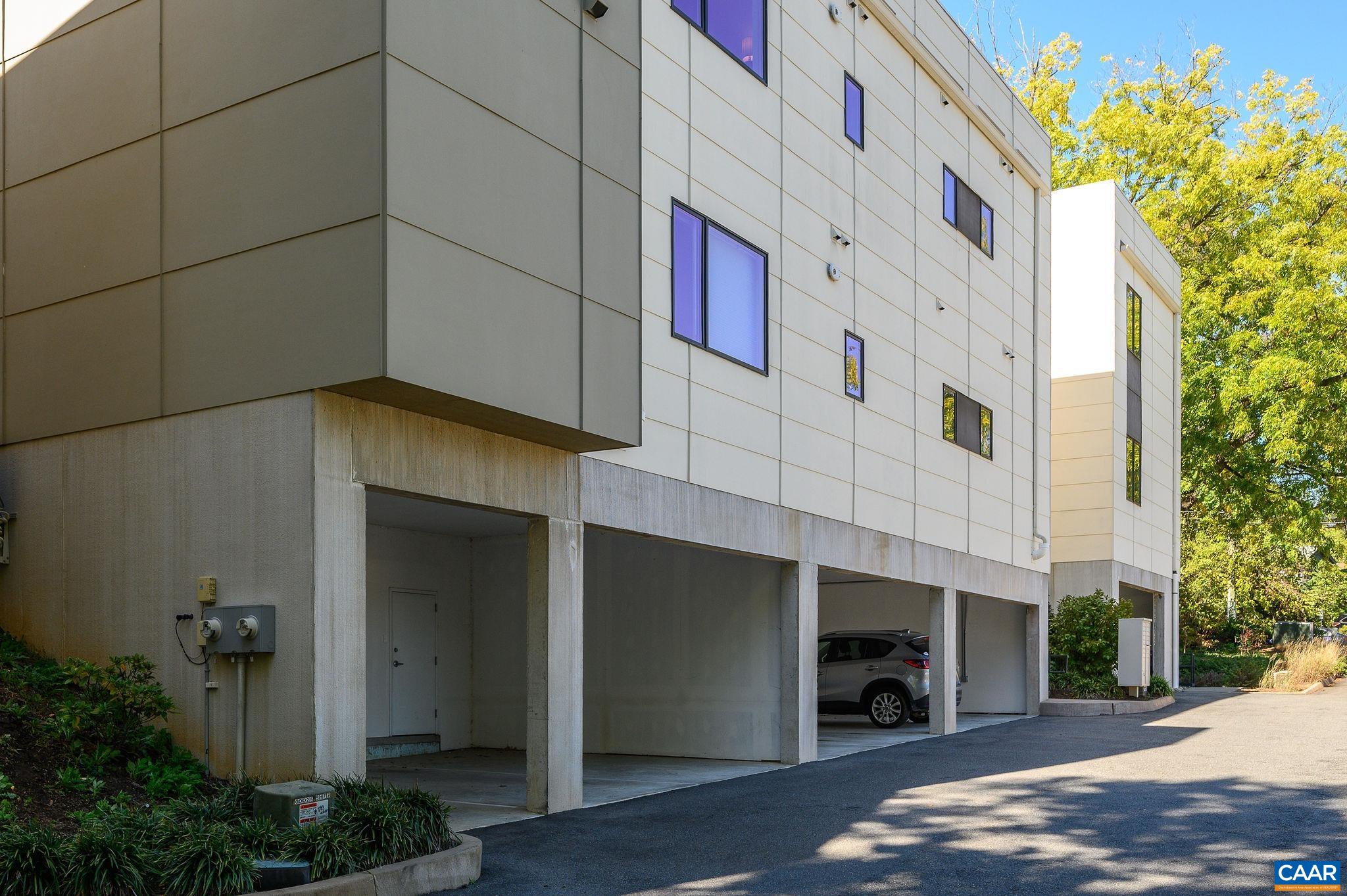 1130 East High Street, Unit J Charlottesville, VA 22902 - Photo 34 of 42 a front view of a building with entryway