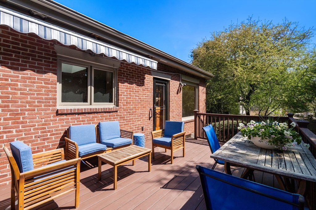 50 Mary Ellen Road Newton, MA 02468 - Photo 20 of 22 a backyard of a house with seating space