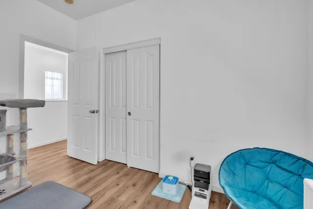 a view of livingroom with furniture and wooden floor