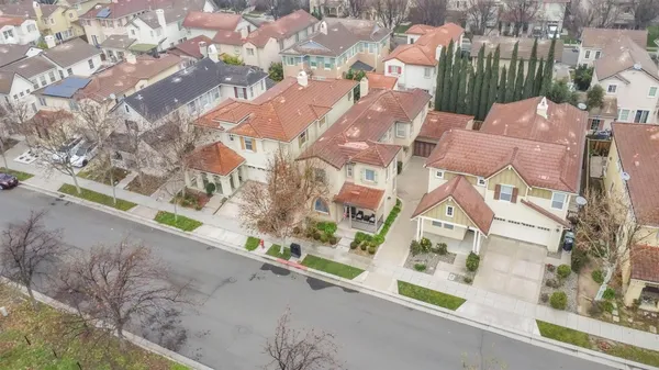 a view of houses with yard