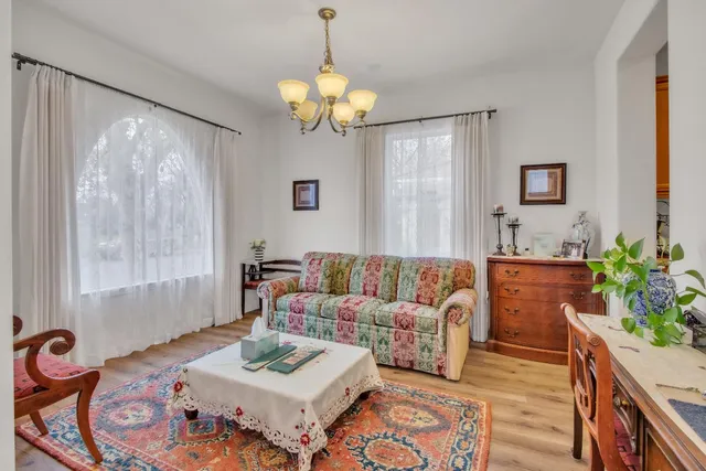 a living room with furniture and a table