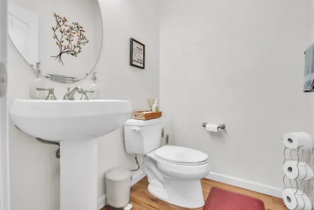 a bathroom with a toilet and a sink