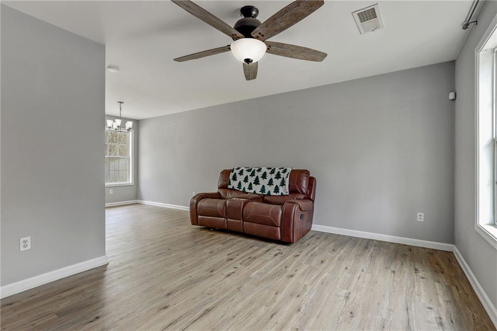54 Taylorsville Road Aragon, GA 30104 - Photo 8 of 20 a living room with furniture and a wooden floor