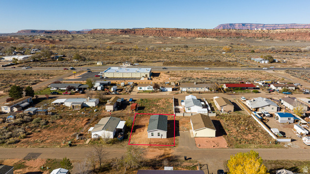 749 Riddle Drive Fredonia, AZ 86022 - Photo 35 of 41 Aerial perspective of suburban area featuring property boundaries highlighted and a mountain backdrop