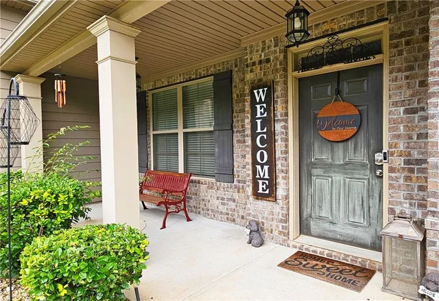 a view of entryway with a table and chairs