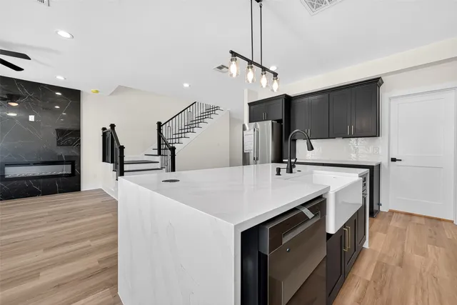 a kitchen with a stove and a microwave
