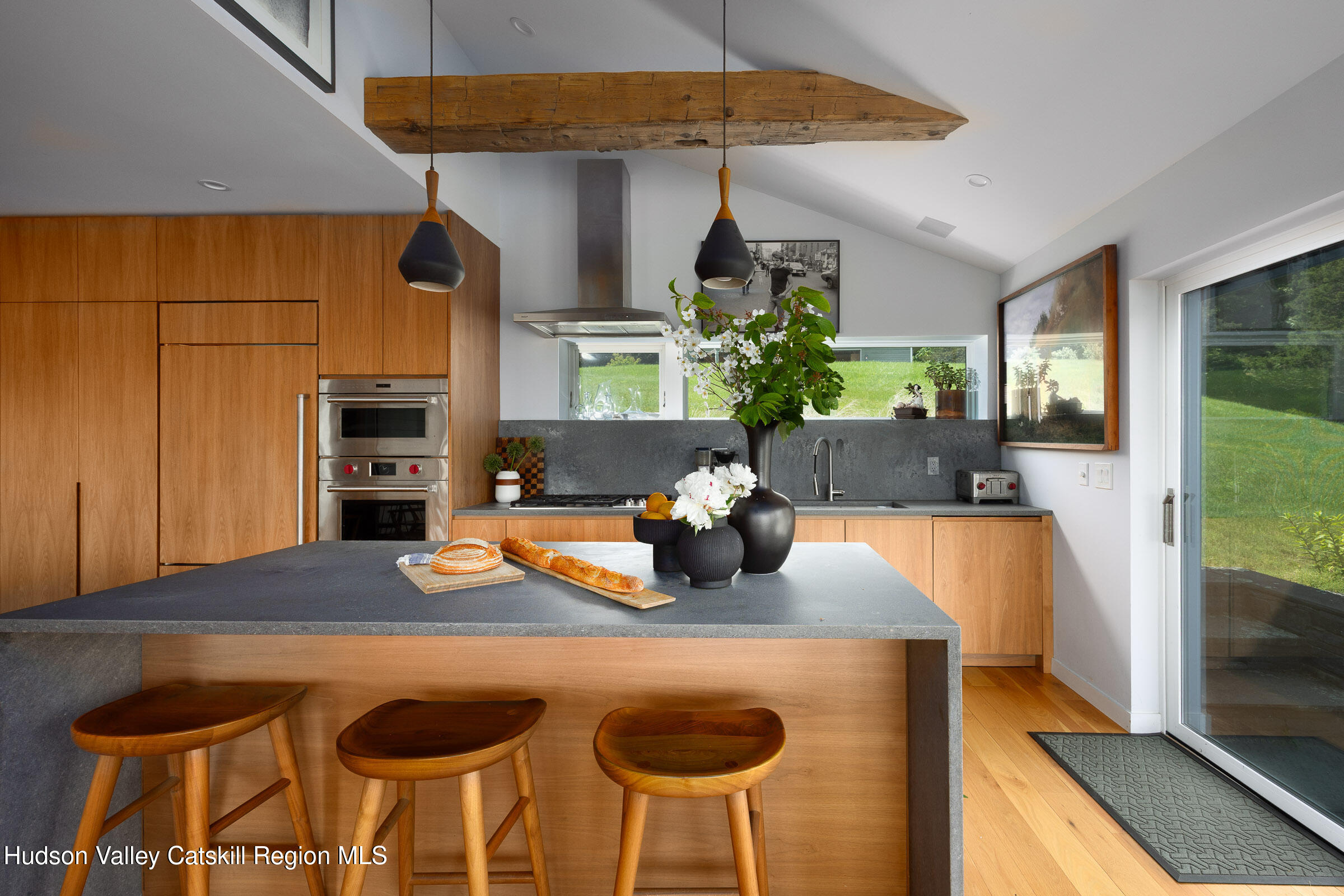 64 Dug Road Accord, NY 12404 - Photo 13 of 44 a kitchen with a table chairs and a stove