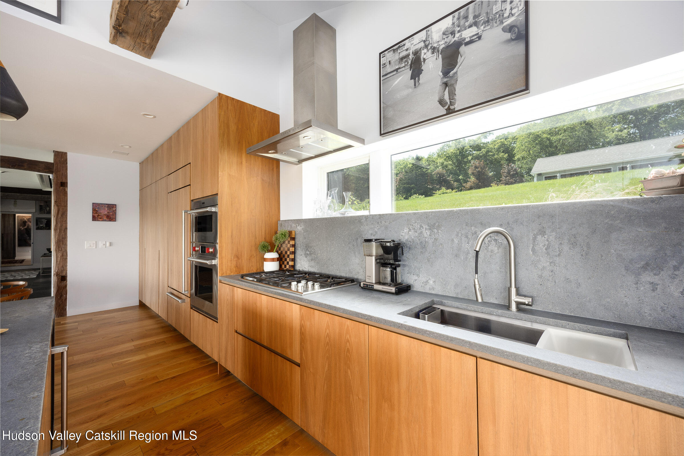 64 Dug Road Accord, NY 12404 - Photo 14 of 44 a view of a kitchen with a sink and wooden floor