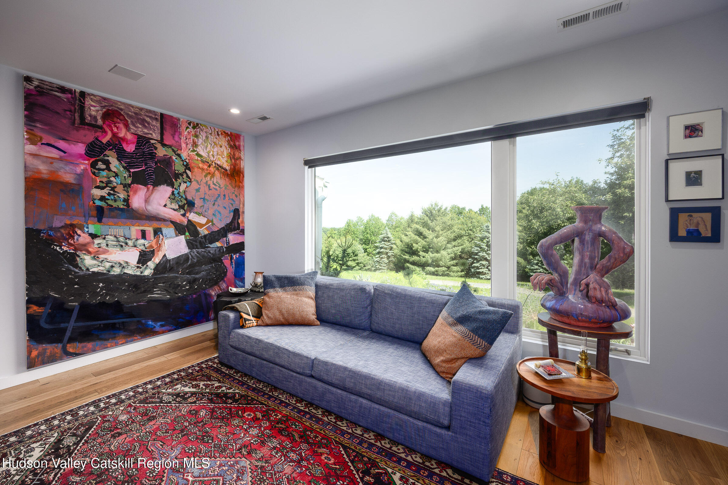 64 Dug Road Accord, NY 12404 - Photo 20 of 44 a living room with furniture and a floor to ceiling window
