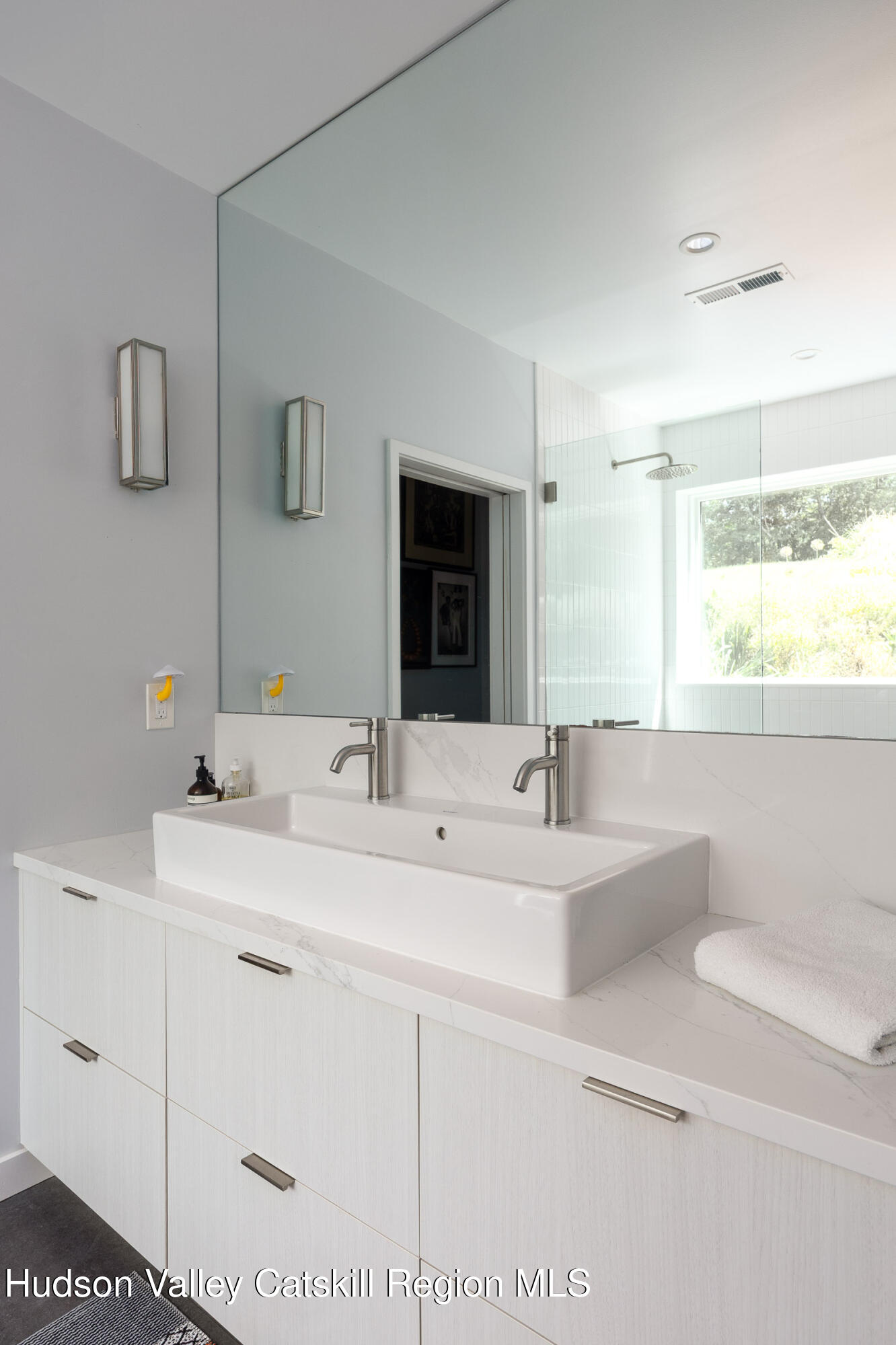 64 Dug Road Accord, NY 12404 - Photo 23 of 44 a bathroom with a sink and a mirror