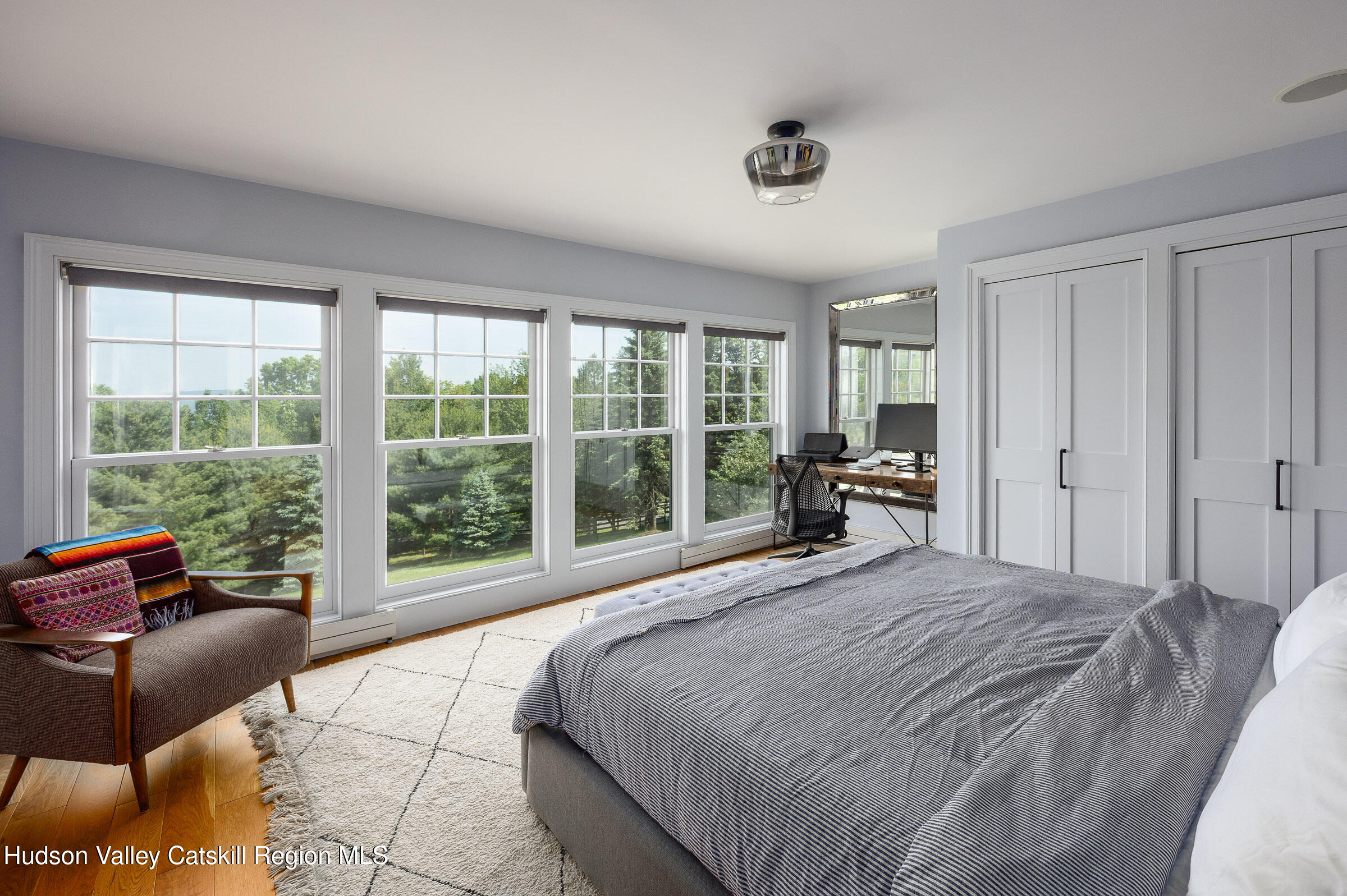 64 Dug Road Accord, NY 12404 - Photo 26 of 44 a large bedroom with a bed and glass windows