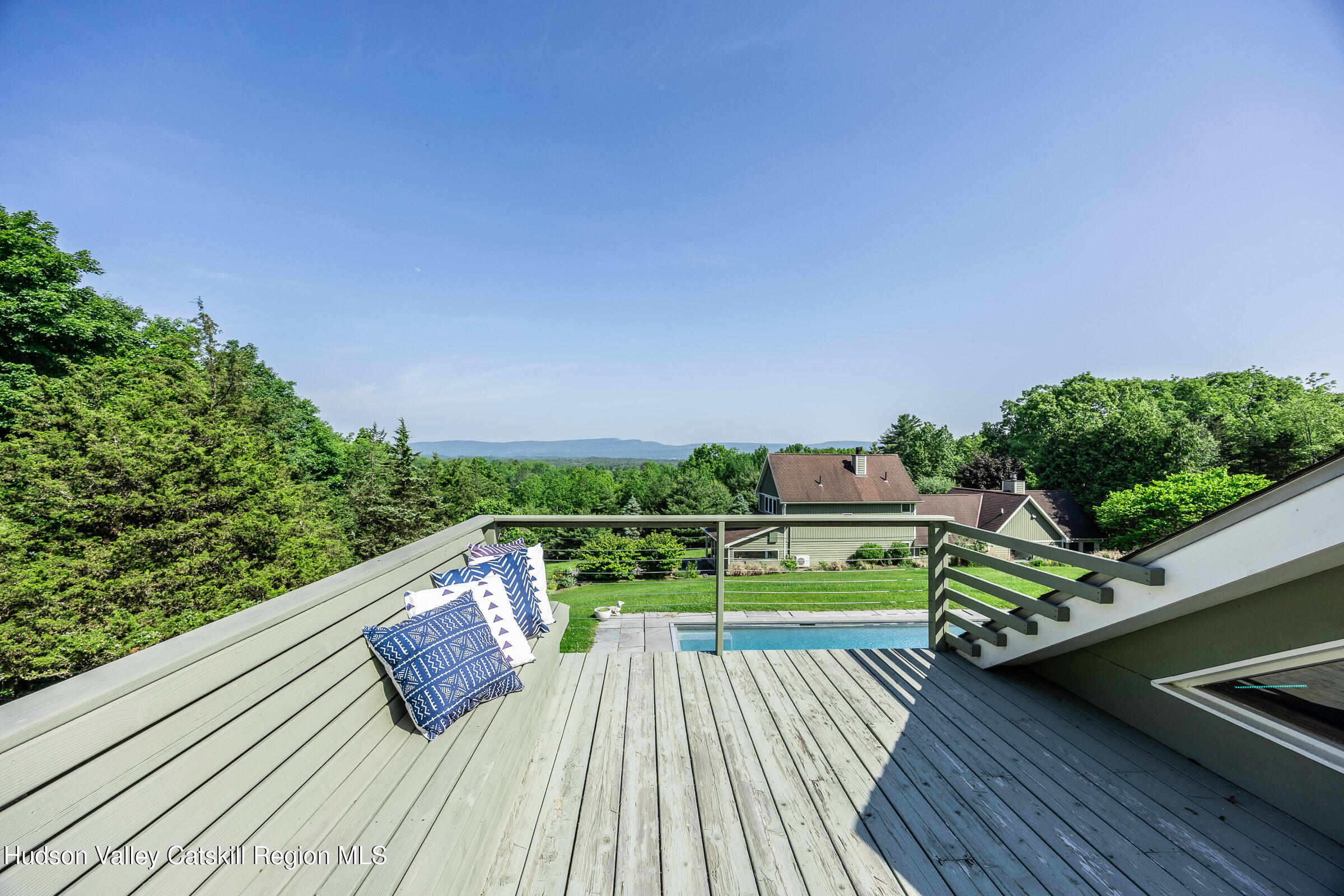 64 Dug Road Accord, NY 12404 - Photo 40 of 44 a view of a balcony with wooden floor and outdoor seating