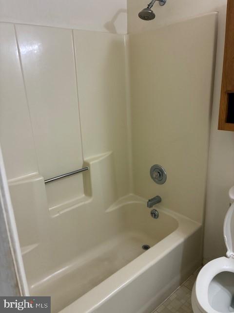 206 Calvert Drive Lusby, MD 20657 - Photo 19 of 32 a bathroom with a bathtub and toilet