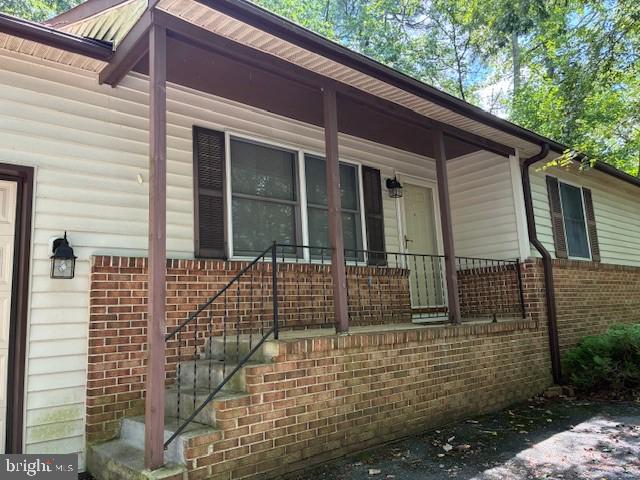 206 Calvert Drive Lusby, MD 20657 - Photo 31 of 32 a front view of a house