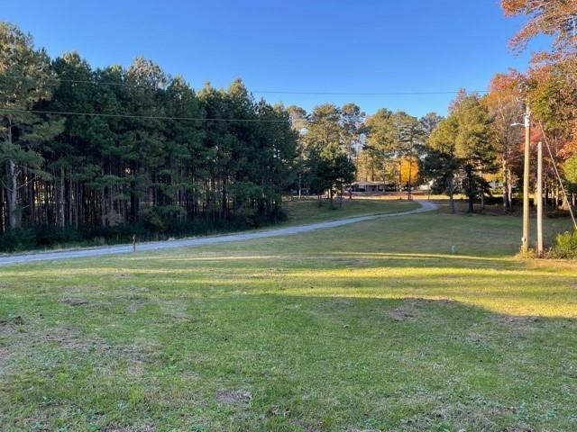 1585 Jimmy Dodd Road Buford, GA 30518 - Photo 29 of 30 a view of a swimming pool with an outdoor space and seating area