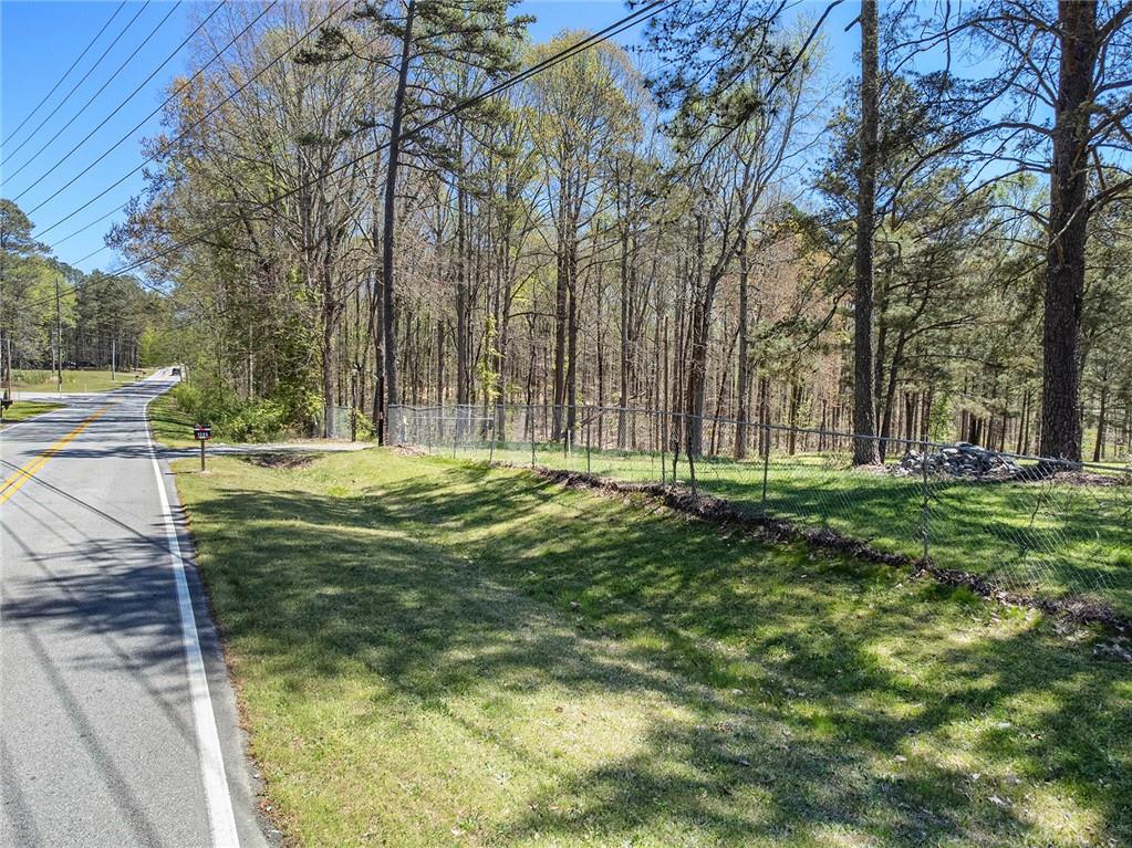 1585 Jimmy Dodd Road Buford, GA 30518 - Photo 5 of 30 a view of a park with large trees