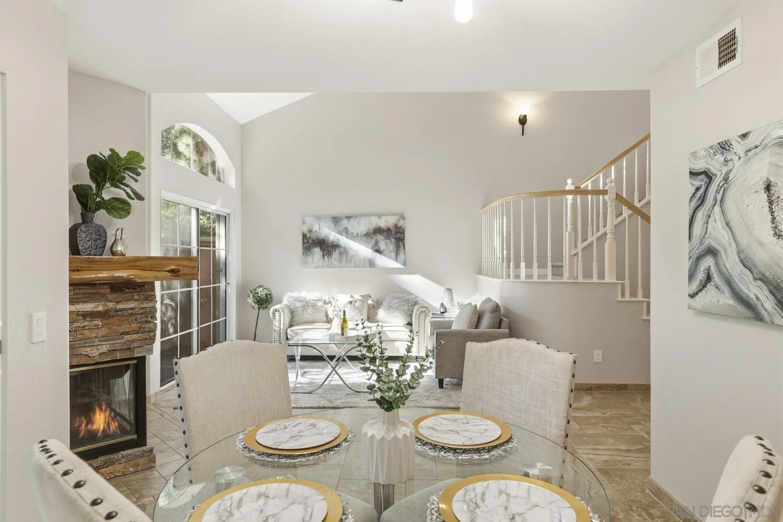 11908 Tivoli Park Row, Unit 7 San Diego, CA 92128 - Photo 7 of 34 a close view of dining table and chairs in a room