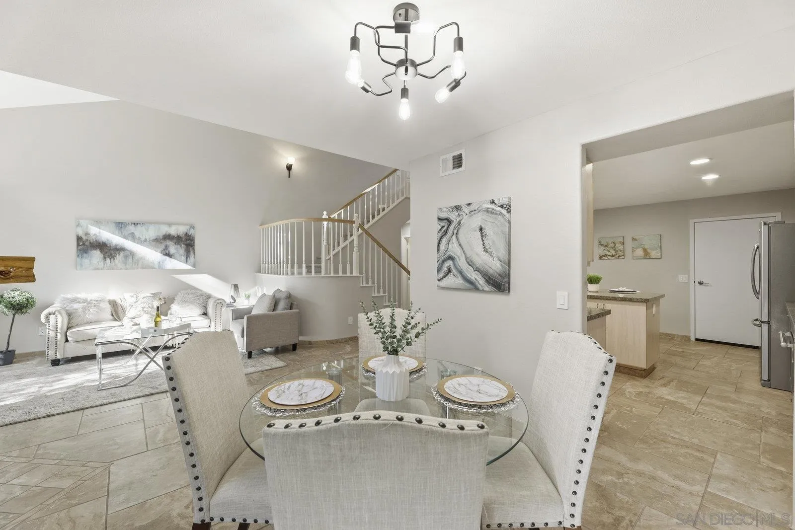 11908 Tivoli Park Row, Unit 7 San Diego, CA 92128 - Photo 8 of 34 a view of a dining room with furniture