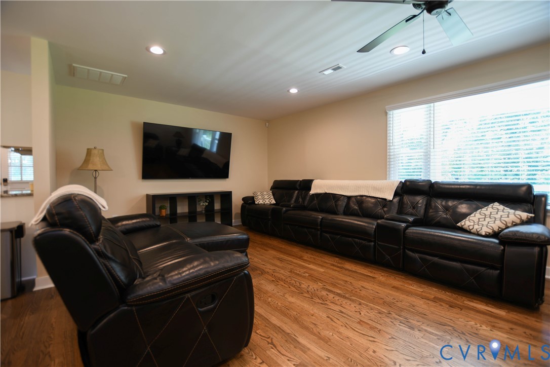 1448 Canterbury Road St. Stephens Church, VA 23148 - Photo 8 of 57 Spacious living area featuring wood-finish floorin