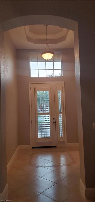 7855 Founders Circle Naples, FL 34104 - Photo 4 of 15 Foyer with Tray Crown Molding, and Volume ceiling
