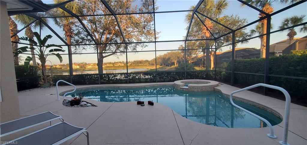 7855 Founders Circle Naples, FL 34104 - Photo 6 of 15 Pool and Spa Overlook the Gorgeous Lake View