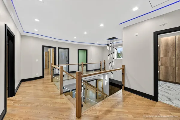a bathroom with a double vanity sink mirror and toilet