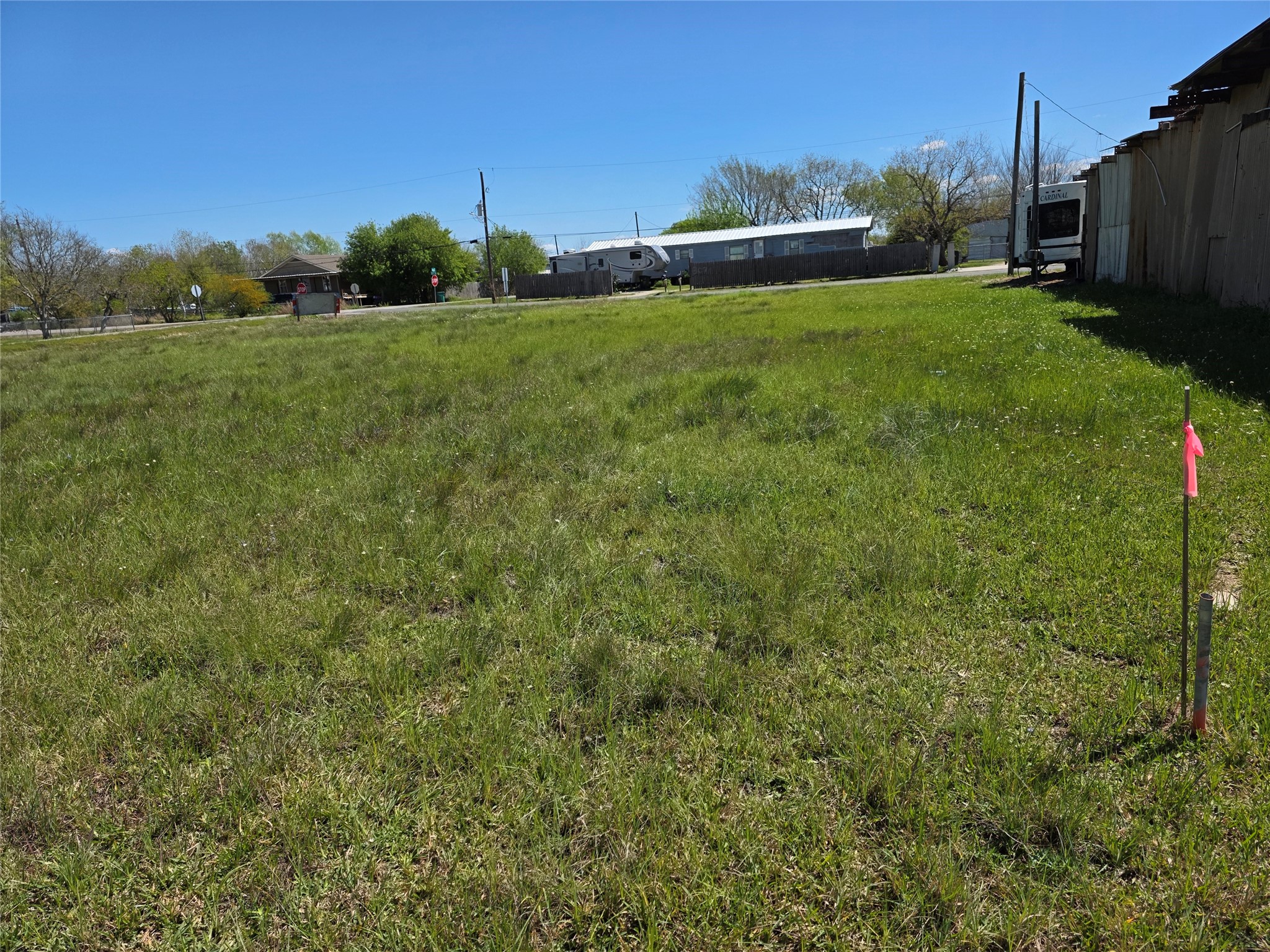 308 20th Street Dickinson, TX 77539 - Photo 2 of 4 a view of a field of grass and trees