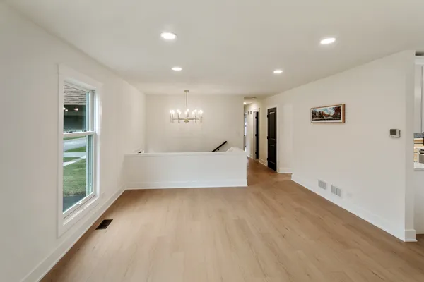 a view of a livingroom with a staircase