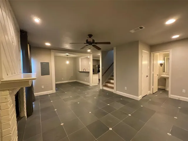 a view of a hallway with a livingroom