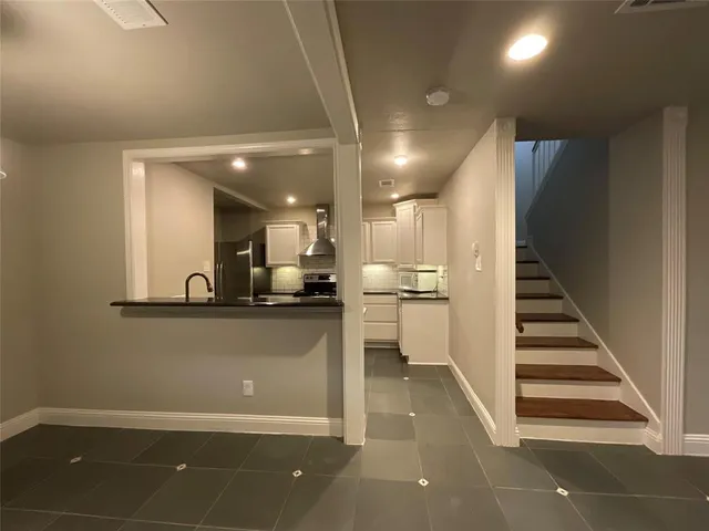 a view of a living room with a sink