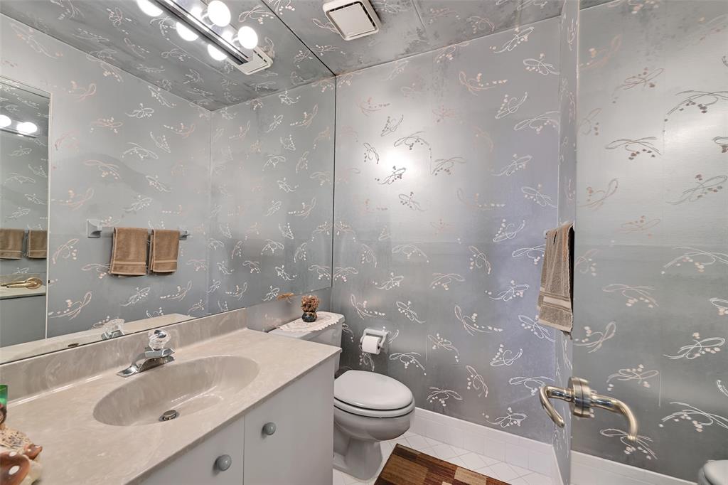 7312 Northwest 83rd Way Tamarac, FL 33321 - Photo 18 of 21 a bathroom with a sink toilet and shower