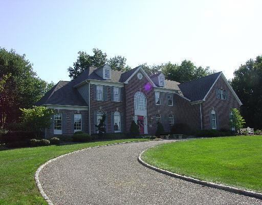 12 Middleton Road Newtown, CT 06470 - Photo 1 of 1 front view of a house with a yard