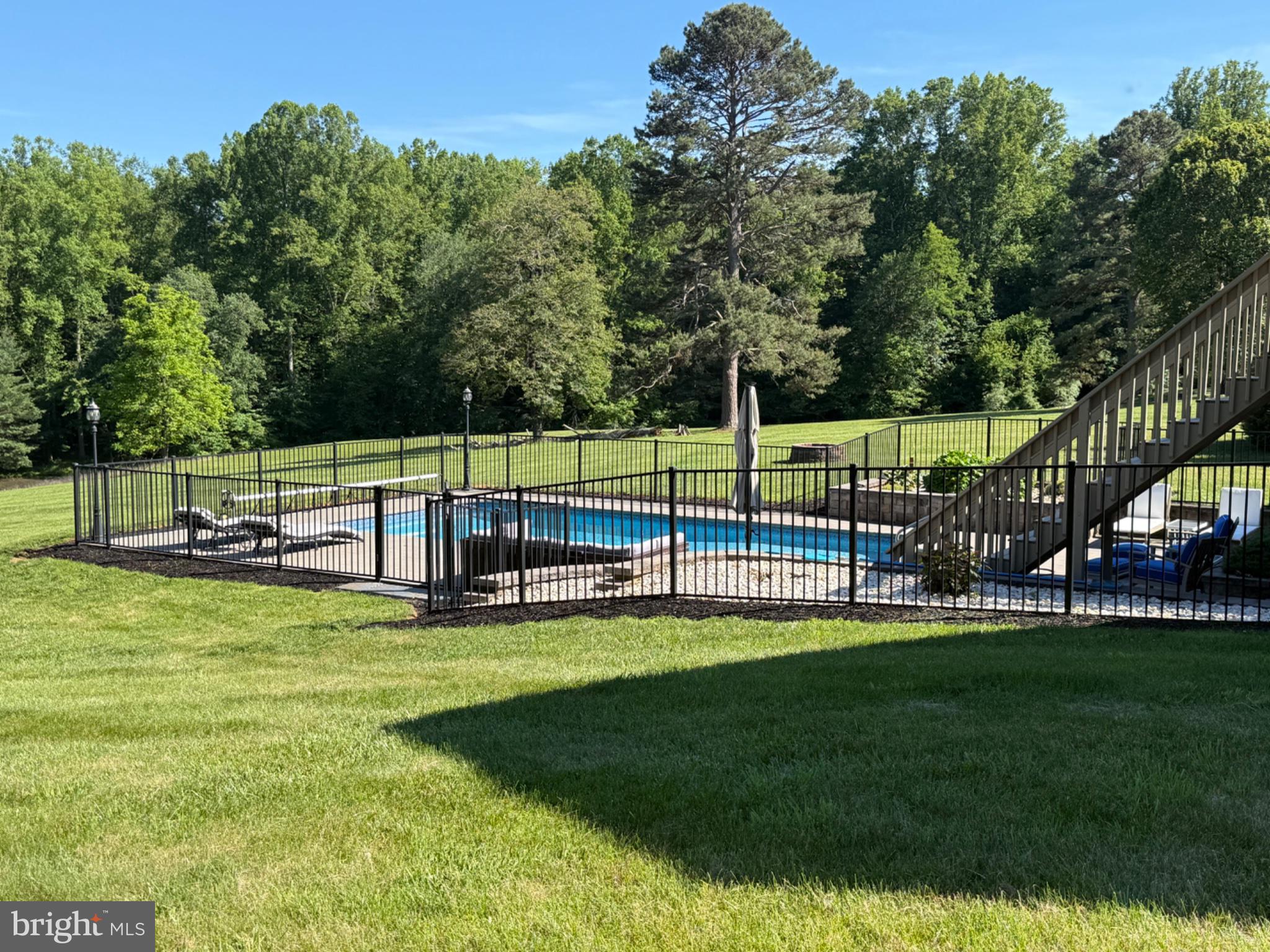 11337 Old Stillhouse Road Boston, VA 22713 - Photo 3 of 7 Serene poolside retreat in rear of home.