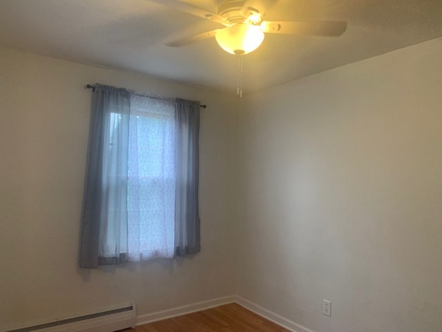 1818 Carr Street Streator, IL 61364 - Photo 14 of 45 an empty room with a window
