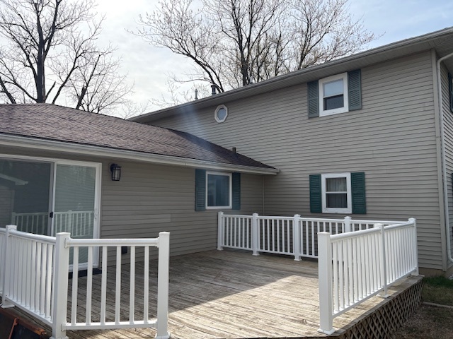 1818 Carr Street Streator, IL 61364 - Photo 33 of 45 a view of a house with a wooden fence