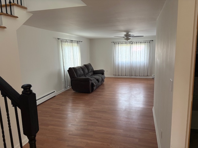 1818 Carr Street Streator, IL 61364 - Photo 42 of 45 a view of an empty room with wooden floor and a window