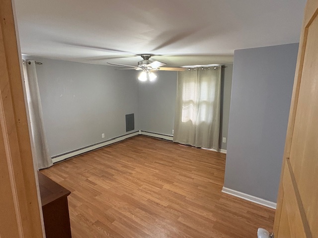 1818 Carr Street Streator, IL 61364 - Photo 44 of 45 an empty room with windows and fan
