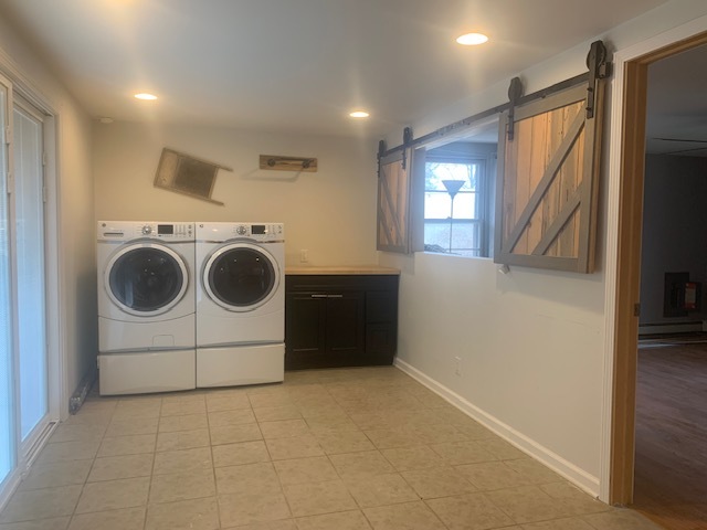 1818 Carr Street Streator, IL 61364 - Photo 7 of 45 a utility room with dryer and washer