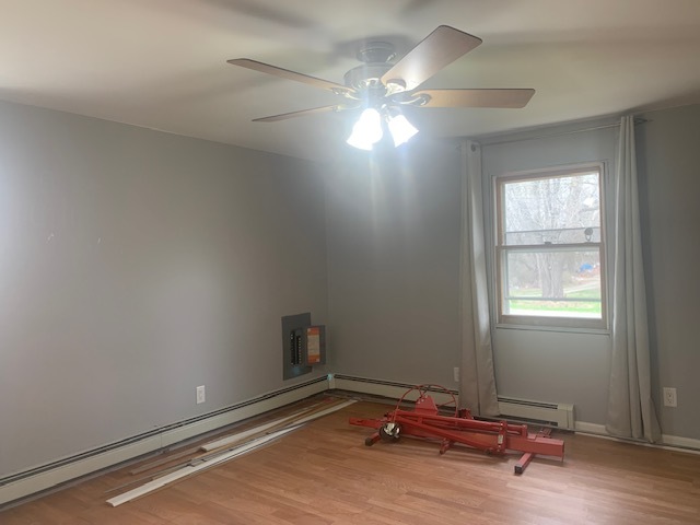 1818 Carr Street Streator, IL 61364 - Photo 9 of 45 a room with gym equipment on the wall and a window