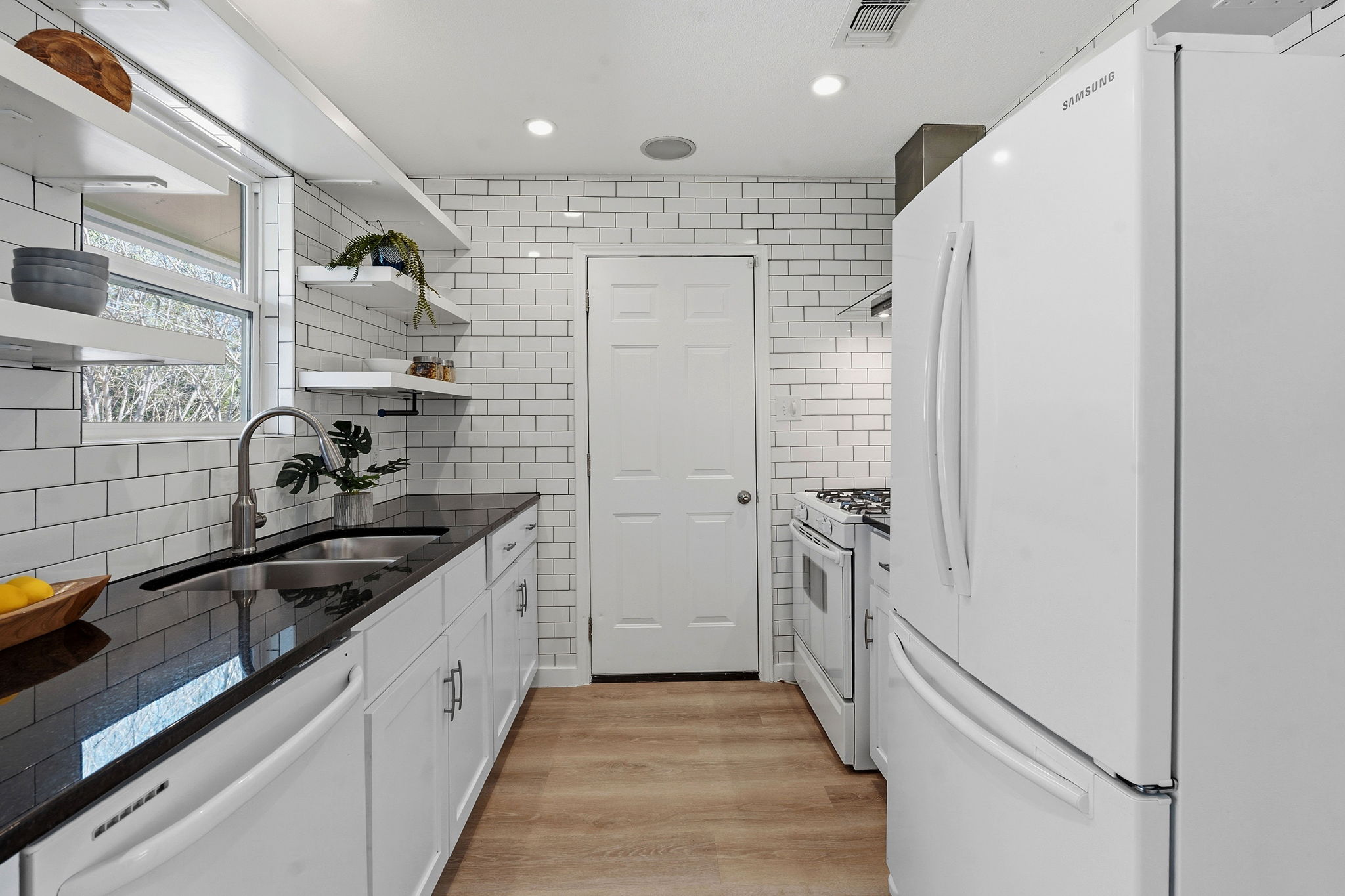 1630 Chippeway Lane Austin, TX 78745 - Photo 17 of 28 Also featuring quartz countertops, recessed lighting and pantry storage.