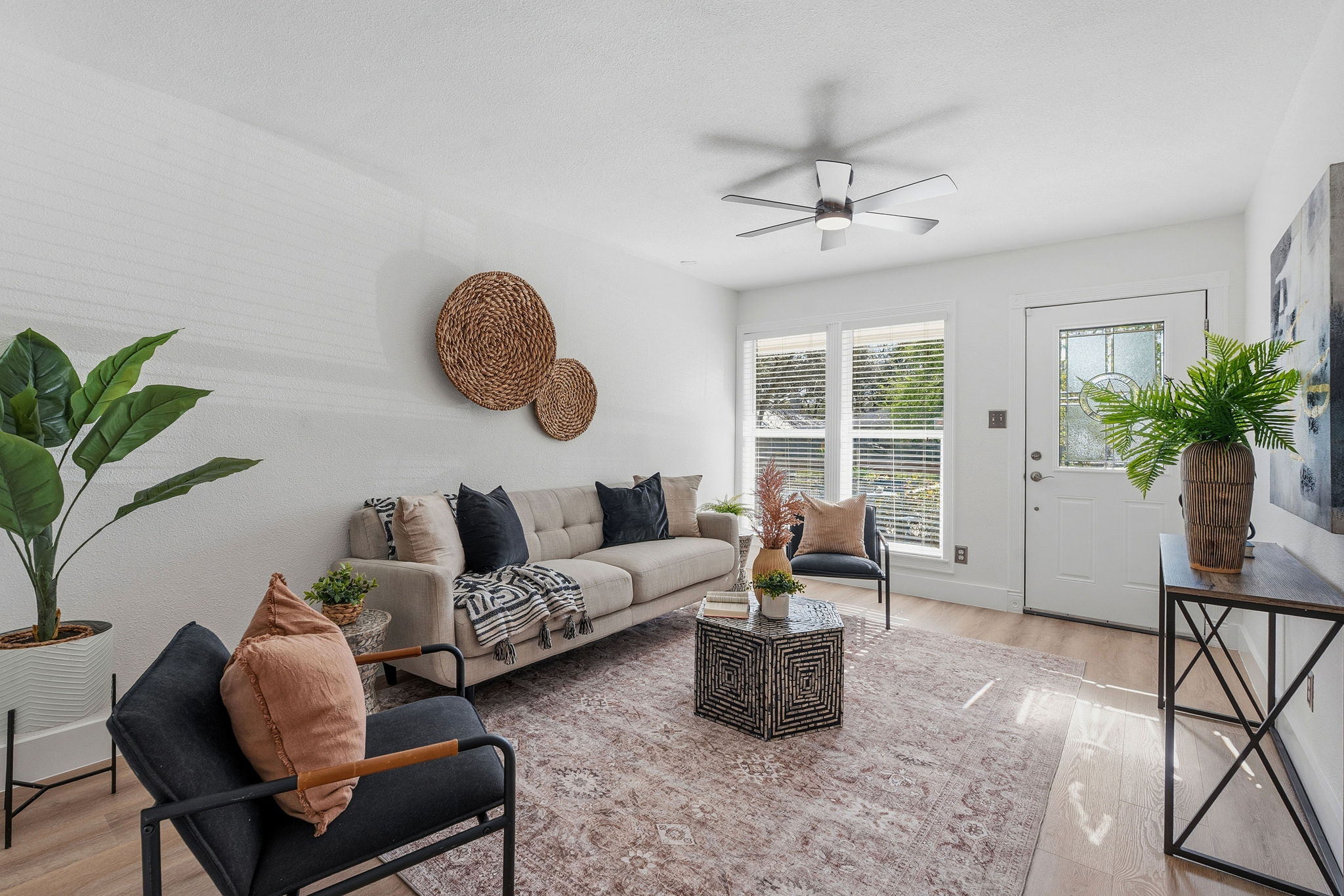 1630 Chippeway Lane Austin, TX 78745 - Photo 2 of 28 Inside, the home is bright and comfortable, with newly installed luxury vinyl plank flooring, crisp white walls, and a clean, modern feel.