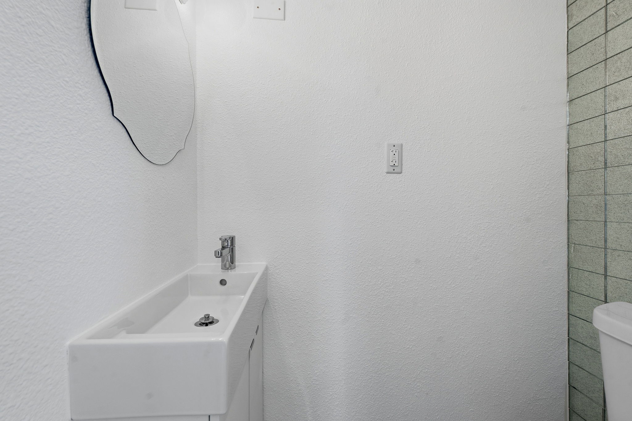 1630 Chippeway Lane Austin, TX 78745 - Photo 25 of 28 There's also a convenient guest powder room so you have that desirable second toilet.