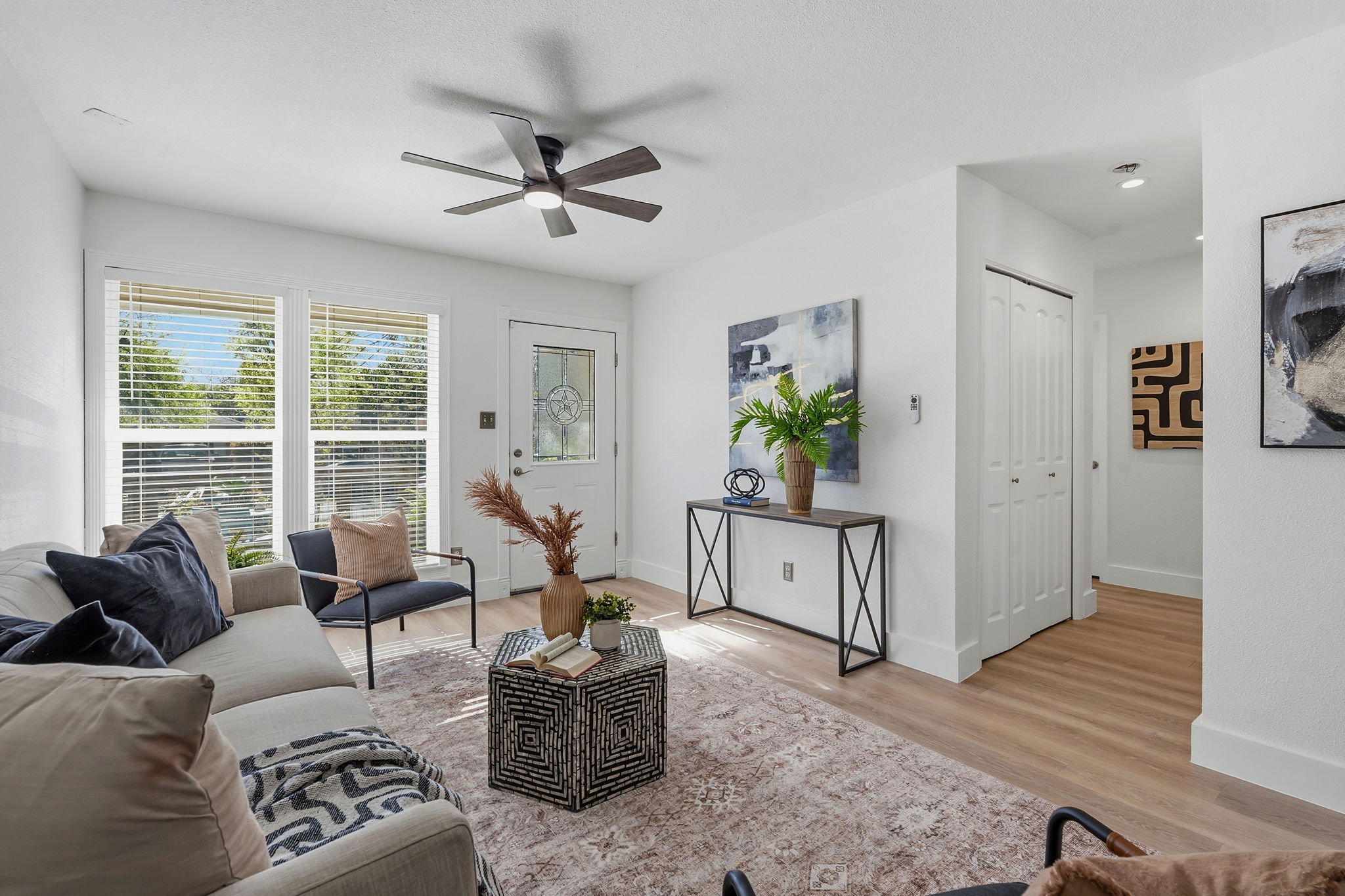 1630 Chippeway Lane Austin, TX 78745 - Photo 10 of 28 The living room fills with peaceful natural light from generous windows that overlook the front yard.