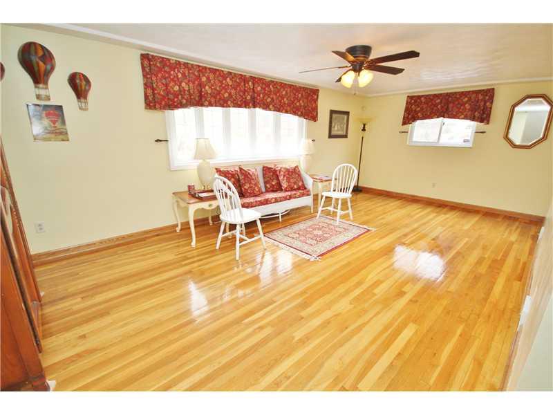 571 Fleming Road Sarver, PA 16055 - Photo 6 of 15 Living Room. Chandelier has been replaced with ceiling fan as current owners used this room as a formal living room that sat 20 people at their Dining Room Table.