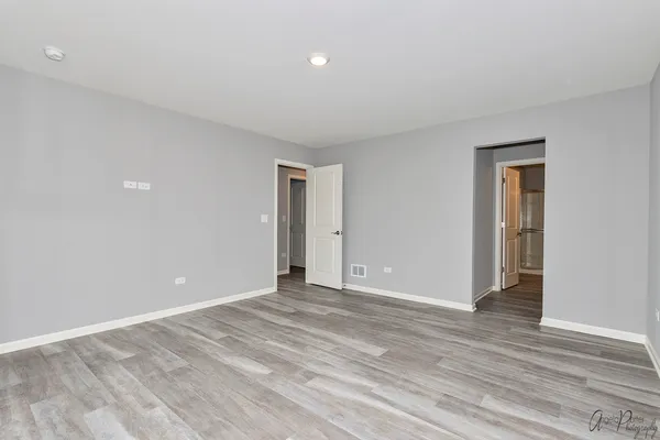 a view of a room with racks on the wall